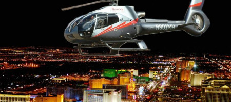 Helicopter flying at night over Las Vegas.&nbsp;